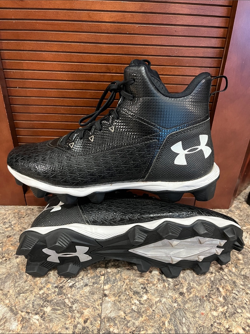 Men’s Under Armour high top cleats